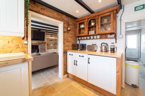 Køkken eller tekøkken på Pinfold Cottage, Dog Friendly Yorkshire Coast & Countryside