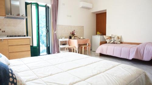 Postel nebo postele na pokoji v ubytování Ondina b&b