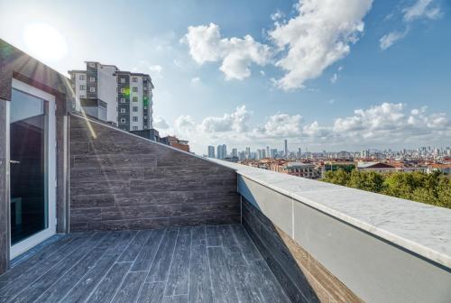 a balcony with a view of the city at Grisverde Suites in Istanbul