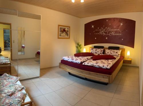 a bedroom with a large bed in a room at Ferienwohnung Hankel in Hemfurth-Edersee