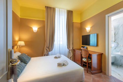 Una cama o camas en una habitación de Hotel Nuvò