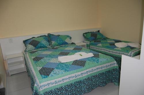 Postel nebo postele na pokoji v ubytování Santorini Hotel