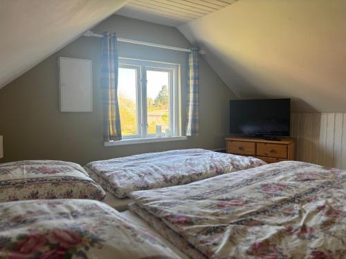 Postel nebo postele na pokoji v ubytování Hus Bockare