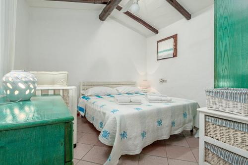 Postel nebo postele na pokoji v ubytování Villa Rosa