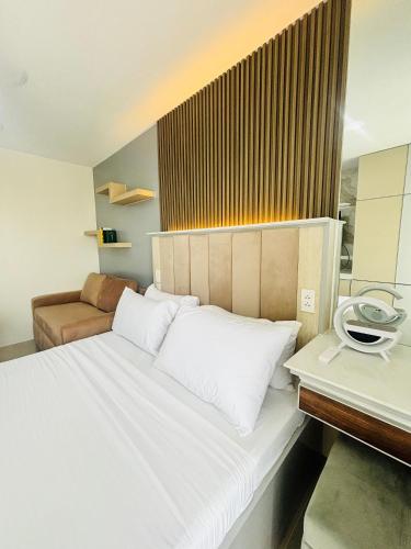 Ένα ή περισσότερα κρεβάτια σε δωμάτιο στο Modern Condo Room with City View