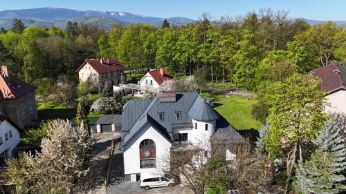 an aerial view of a house in a village at PARKOVA APARTAMENTY - termy, centrum, park in Jelenia Góra