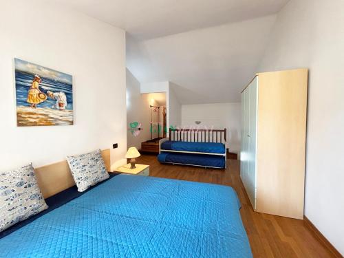 Ένα ή περισσότερα κρεβάτια σε δωμάτιο στο Palme