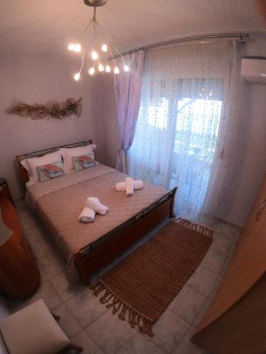 Katil atau katil-katil dalam bilik di Sophia View Home- εξοχική κατοικία με θέα την θαλασσα