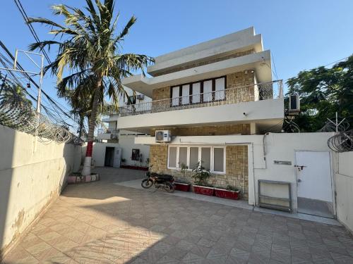 Balkón nebo terasa v ubytování E Town Room Guest House Karachi