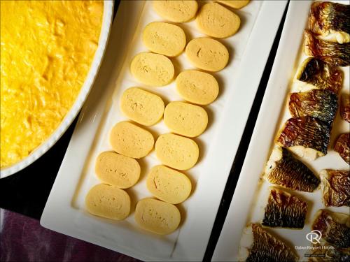 a plate of food with cookies on top of it at Daiwa Roynet Hotel Kumamoto in Kumamoto