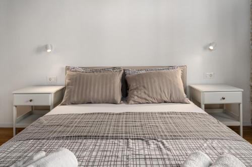 Ένα ή περισσότερα κρεβάτια σε δωμάτιο στο Apartments Eliza