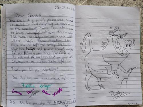 a notebook with a drawing of a cow on it at Ducks Nest in Malelane