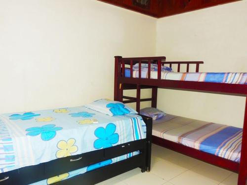 Postel nebo postele na pokoji v ubytování Apartamentos Manatwar