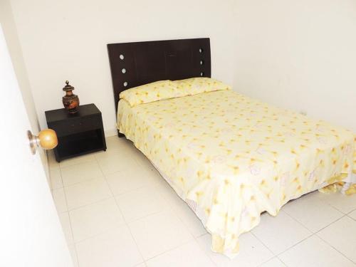 Postel nebo postele na pokoji v ubytování Apartamentos Manatwar