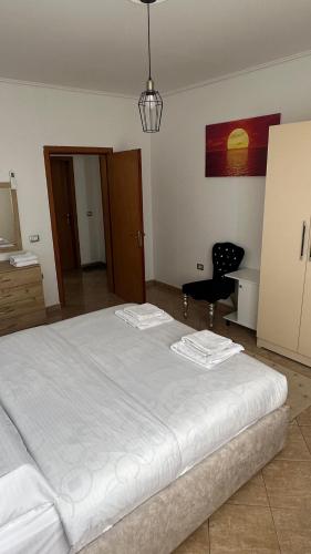 Ліжко або ліжка в номері Sena's Apartment