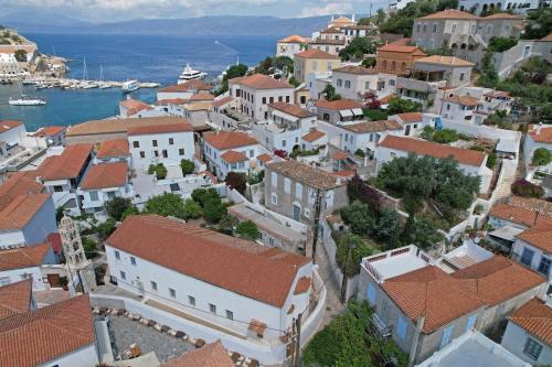 an aerial view of a town with buildings at Astraea 7 in Hydra