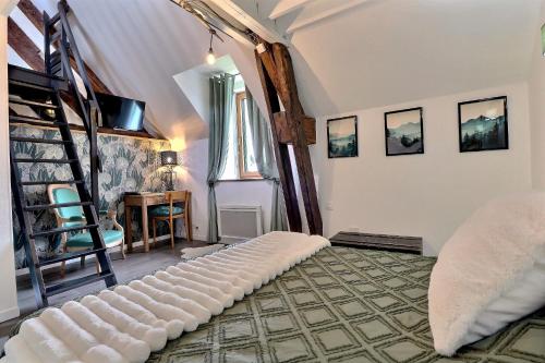 Cama o camas de una habitación en Chambres D'HÔTES