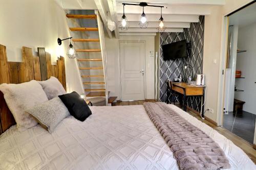 Cama o camas de una habitación en Chambres D'HÔTES