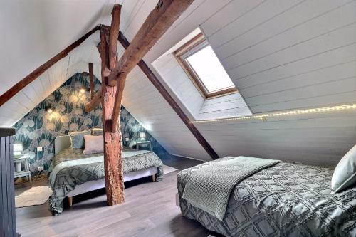 Cama o camas de una habitación en Chambres D'HÔTES