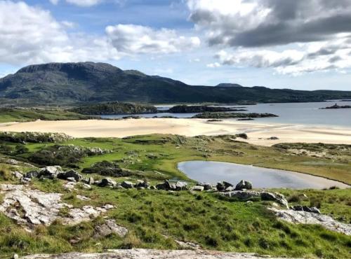 a view of a beach and a body of water at Eden House and Pet Farm in Feevaghmore