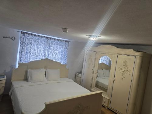 Postel nebo postele na pokoji v ubytování Zimmer corse 08