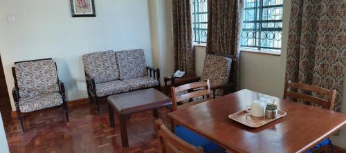 Χώρος καθιστικού στο Kenya Comfort Hotel