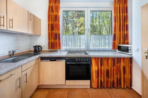 Dapur atau dapur kecil di Ferienwohnungen zur Reuse