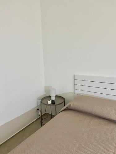 Ένα ή περισσότερα κρεβάτια σε δωμάτιο στο Faro 33
