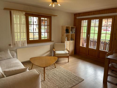 Prostor za sedenje u objektu Grand appartement calme avec vue, balcon et parking couvert