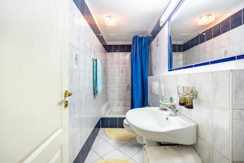 Ένα μπάνιο στο Ferienwohnung Marianna