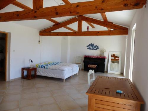 Katil atau katil-katil dalam bilik di Villa vue mer dans un cadre enchanteur
