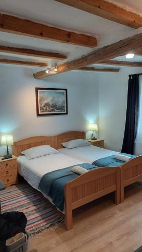 Postel nebo postele na pokoji v ubytování EVA HOUSE