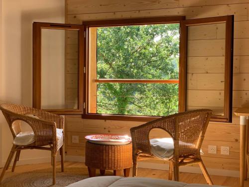 Zona de estar de Chambre confortable à la campagne