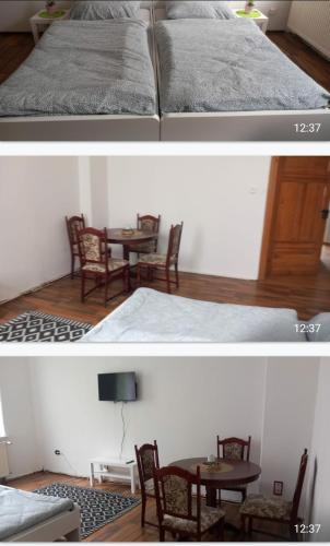 a room with a bed and a table and chairs at Monteurwohnung bei Nina 1OGR in Zeitz