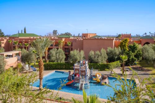 a resort with a pool with a water park at Aquafun By Grand Mogador Agdal in Marrakech
