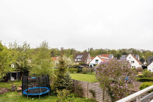 a view of a yard with a trampoline at Bad day good day in Horn-Bad Meinberg