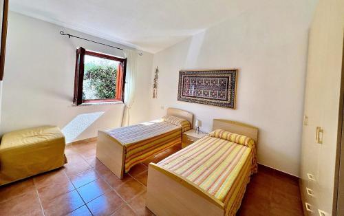 Postel nebo postele na pokoji v ubytování CASA PISCINA Fois