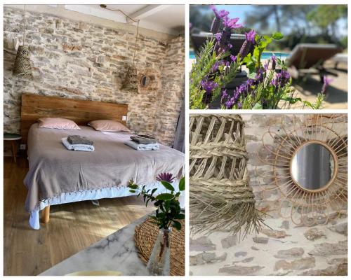 une chambre avec un lit et un mur en pierre dans l'établissement La Pampa, à Nîmes