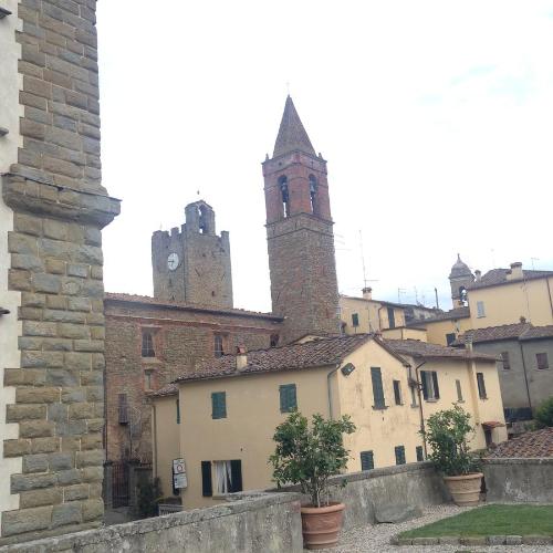 a view of a town with two towers at Tre Girasoli in Monte San Savino