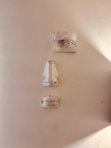 a white cake with eyes on top of it at Maison de Maff in Pesaro