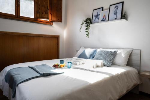 Ένα ή περισσότερα κρεβάτια σε δωμάτιο στο Sabbia & Pinoli - Tirrenia, Pisa