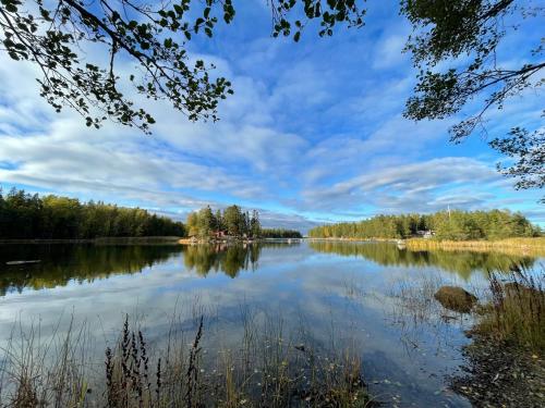 a view of a lake on a cloudy day at Henar Bed & Breakfast in Gävle