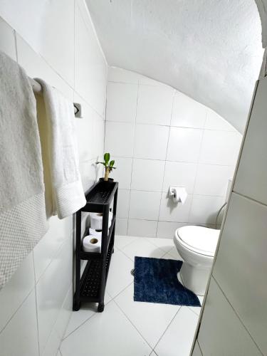 Ένα μπάνιο στο Habitación doble con entrada independiente y baño privado