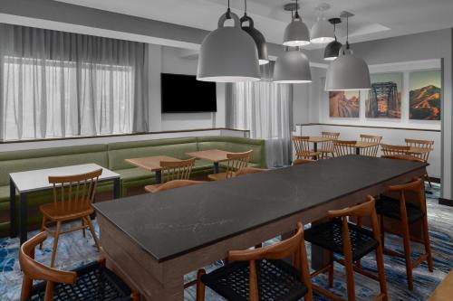 a dining room with a large table and chairs at Fairfield Inn by Marriott Santa Clarita Valencia in Santa Clarita