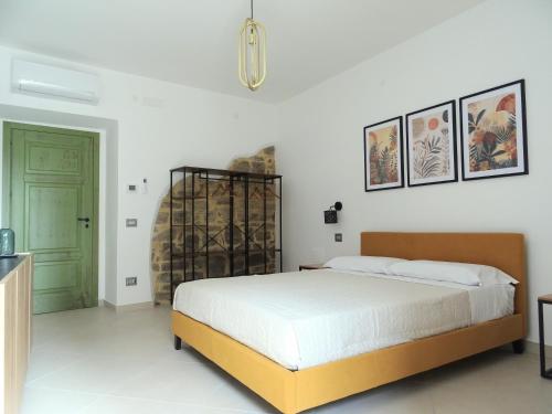Letto o letti in una camera di Il Cortiletto