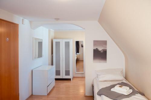 Haus99 Budget Pension & Apartmentsにあるベッド