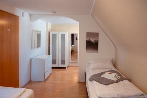 Haus99 Budget Pension & Apartmentsにあるベッド