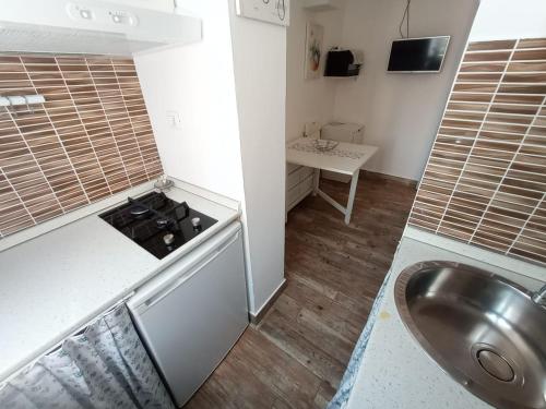 Dapur atau dapur kecil di Apartament Pontetto I Gabbiani