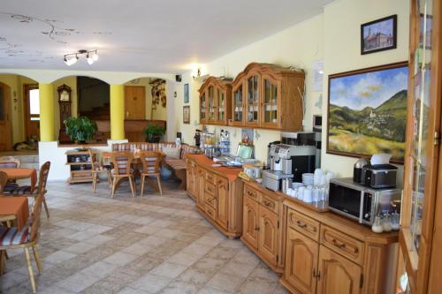 Reštaurácia alebo iné gastronomické zariadenie v ubytovaní Penzión Stefanshof