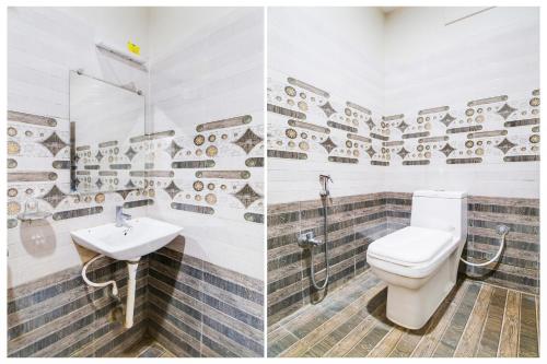 a bathroom with a toilet and a sink at Super Hotel O Gurudwara Near RTC Complex in Visakhapatnam